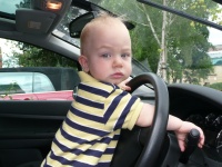 Little 2 Years Old Boy Drives A Car