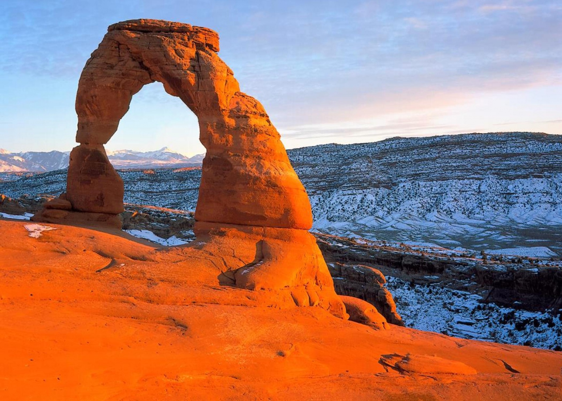 A huge natural arch at sunset at Arches National Park in Arizona, USA