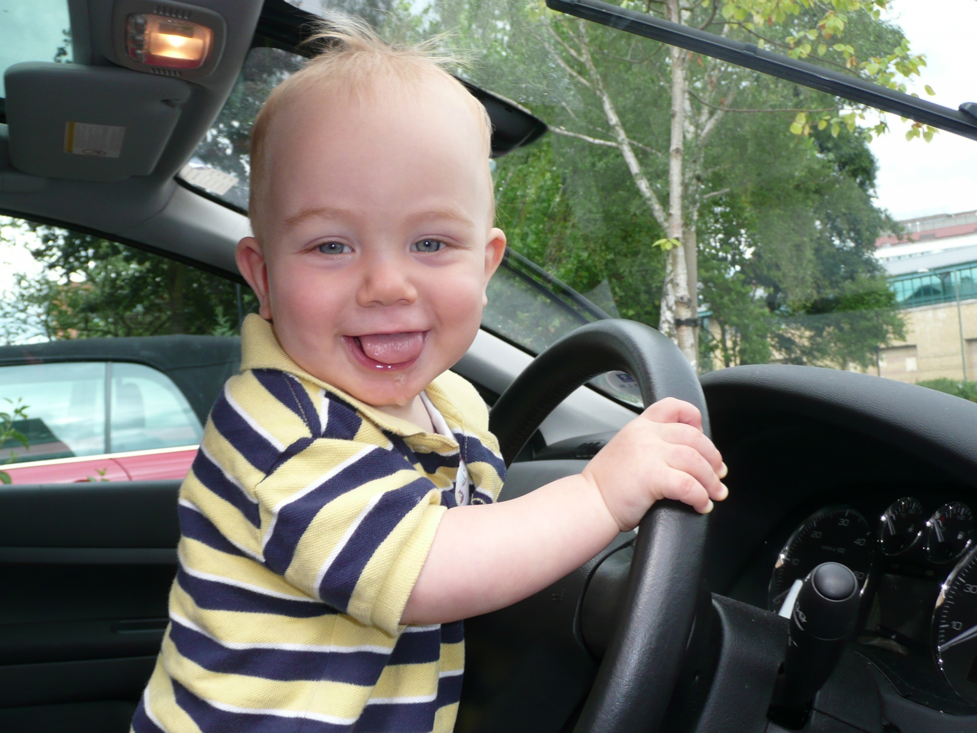 Little 2 Years Old Boy Drives A Car