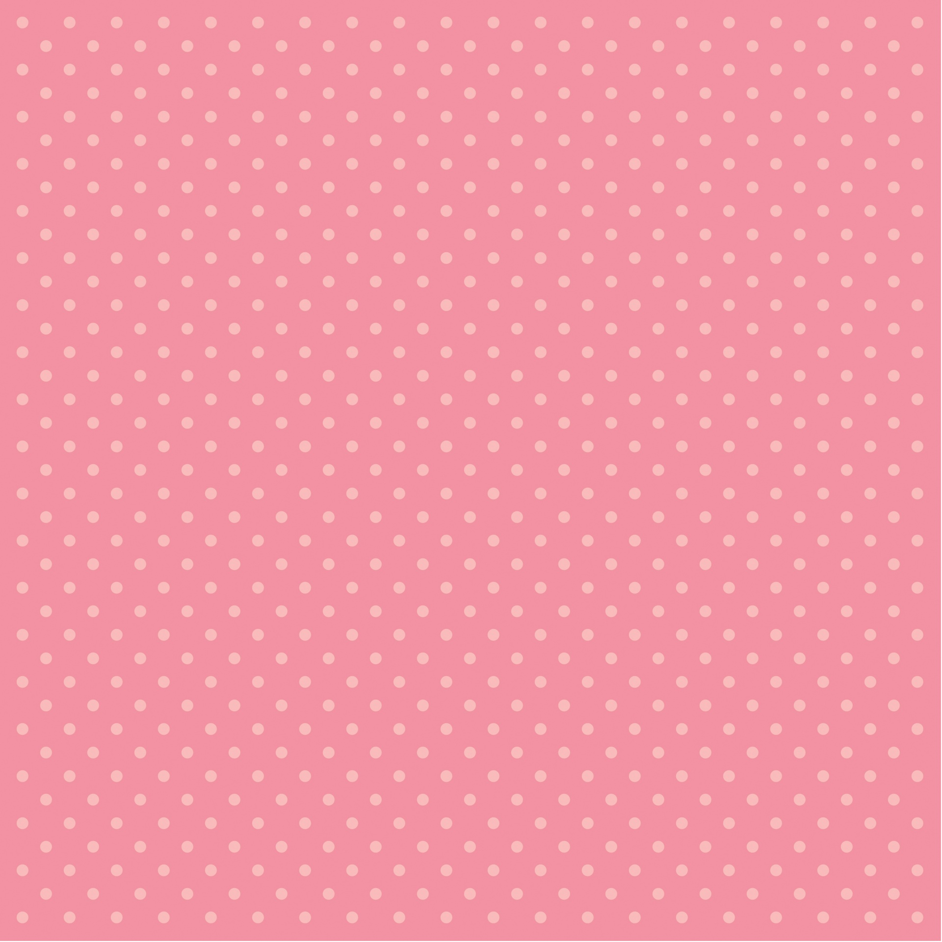 Vintage style polka dots background in pink