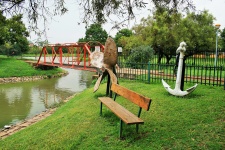 Bench In Park With Marine Artefacts