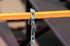 Chain Attached To Yellow Bar