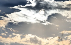 Orb Of Sun Through Clouds