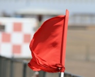 Red Flag Tied To Pole