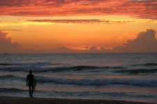 Surfer Enjoying Seaside Sunset