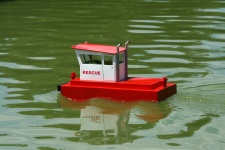 Red & White Rescue Craft In Pond