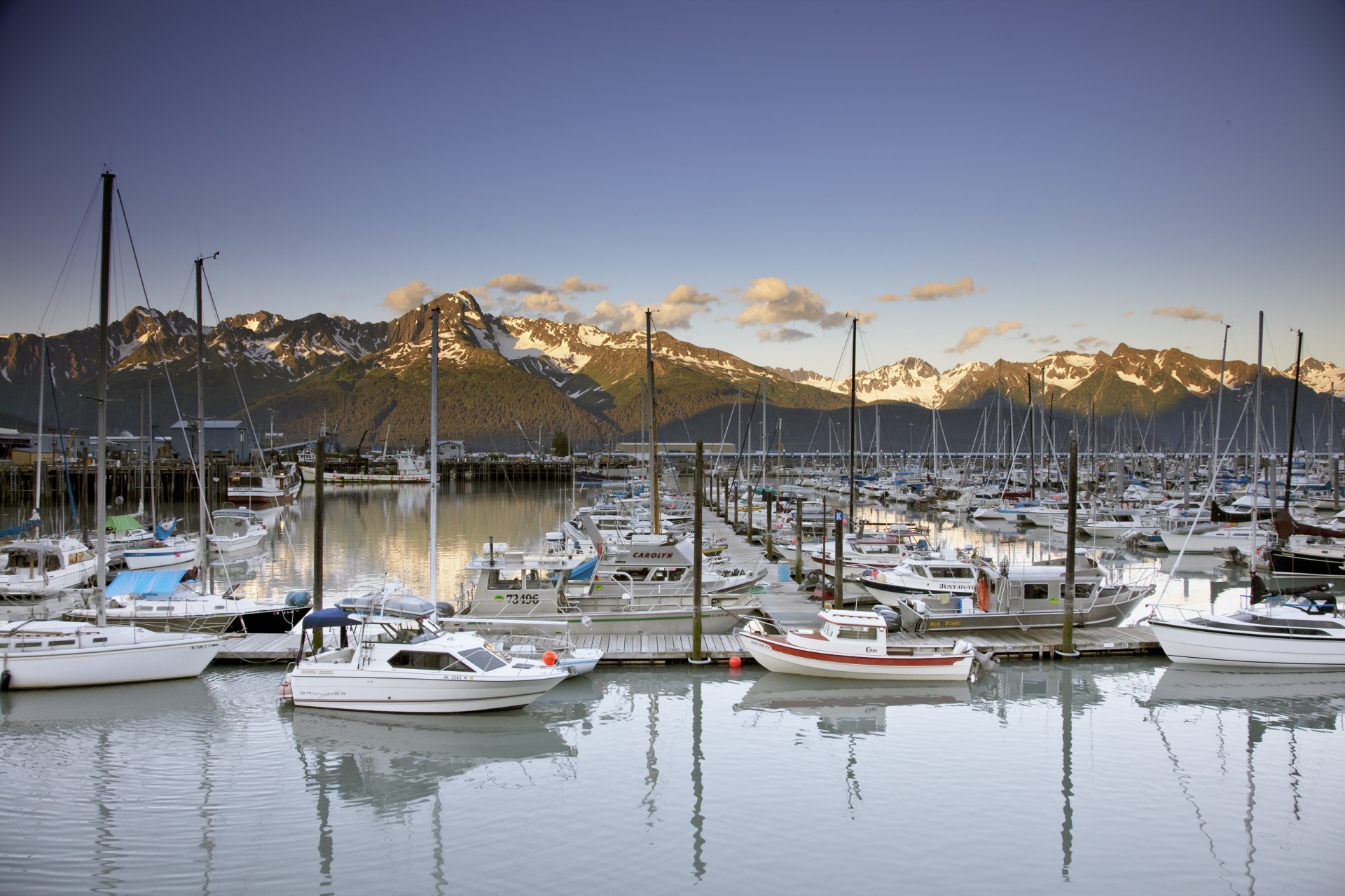 Boats in port at the dawn of a new day in Alaska