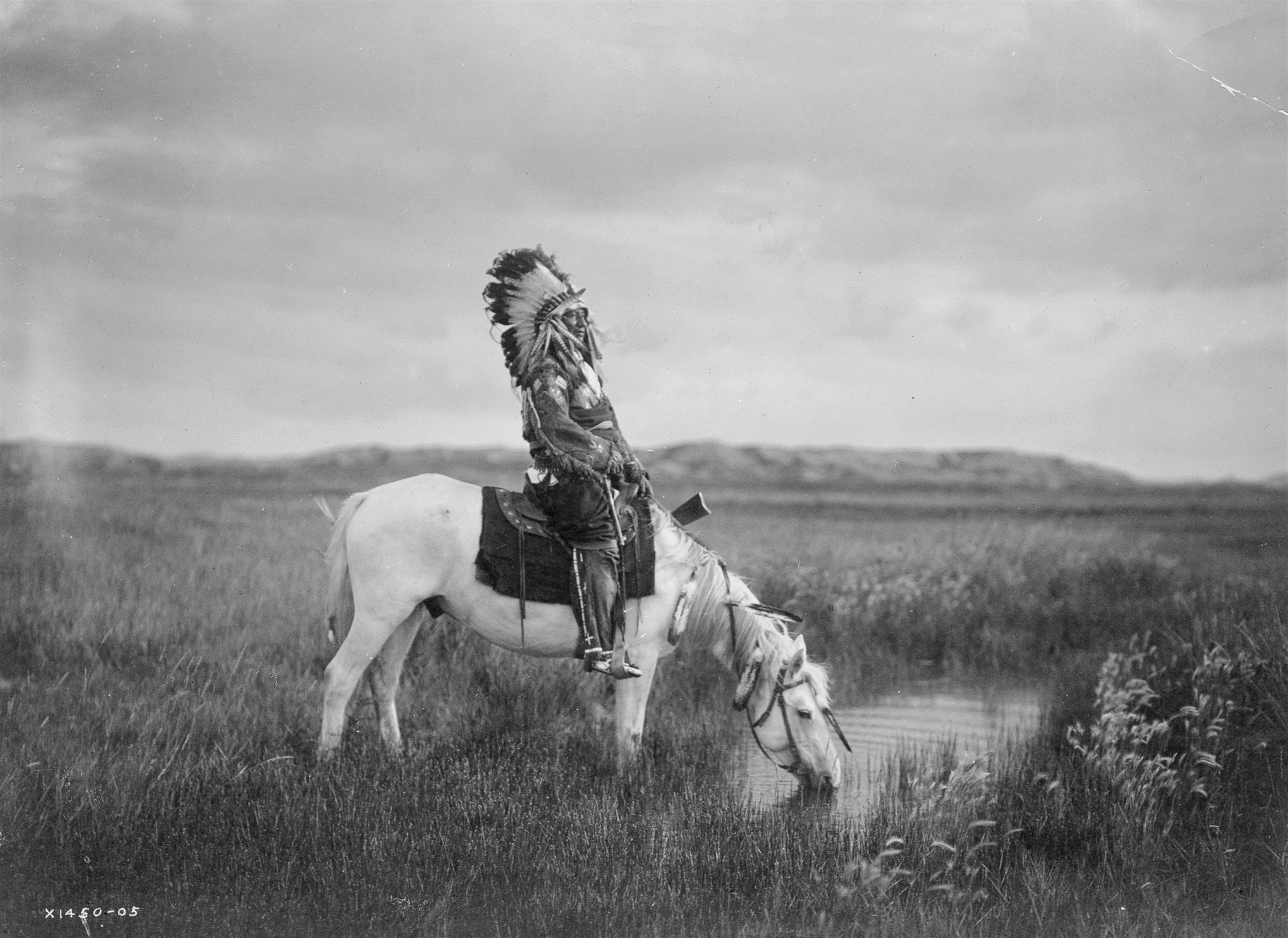 Historical Indian American Chief on his horse - beautiful vintage digital photography image. A view into the culture and traditions of Indo-Americans