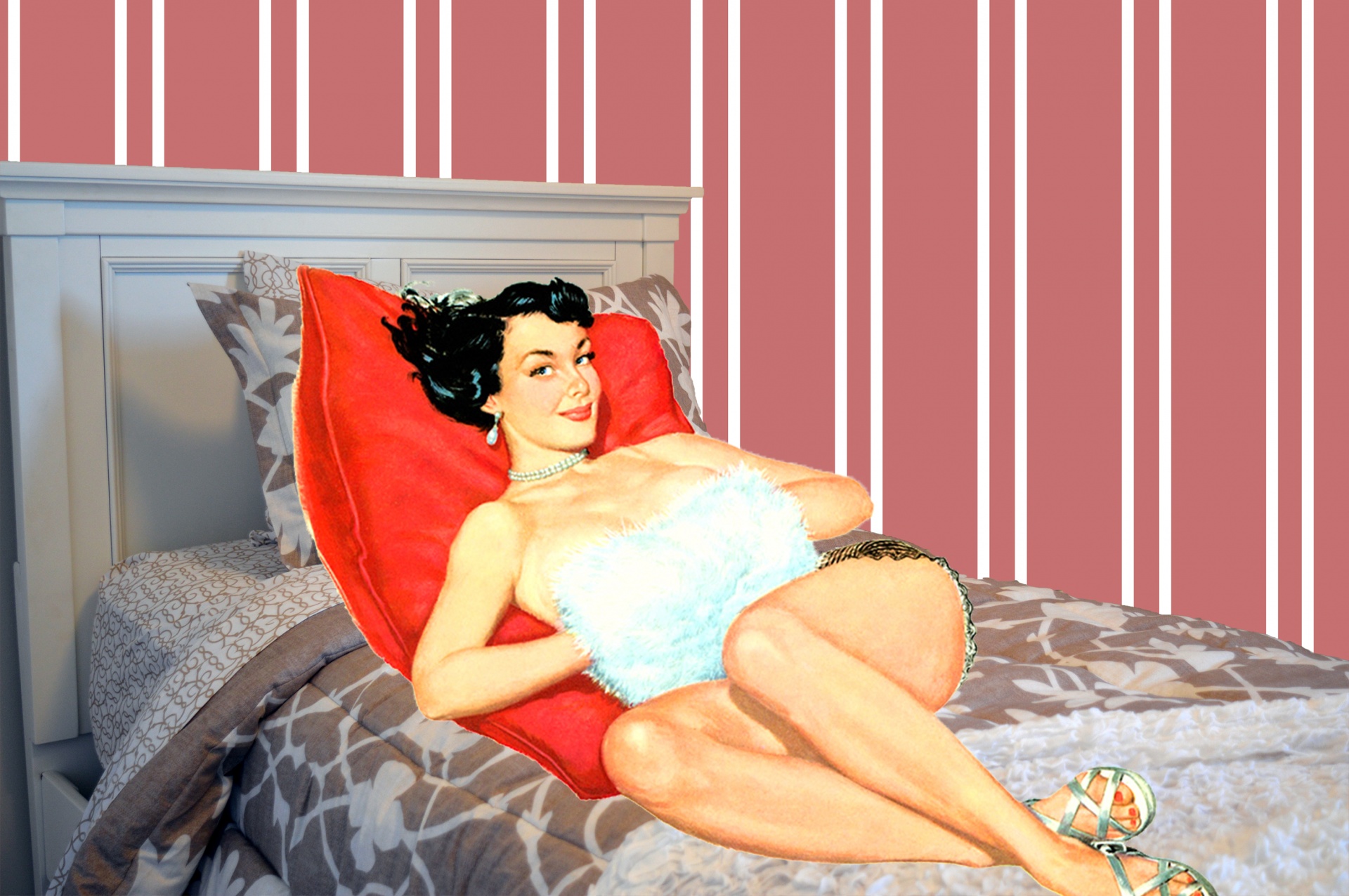 Pin-up Girl Reclining On Bed