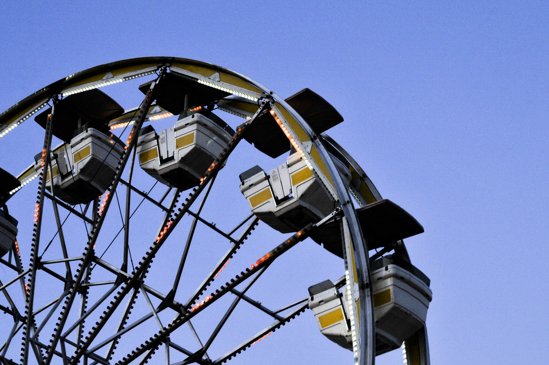Partial view of the cars on a Ferris wheel