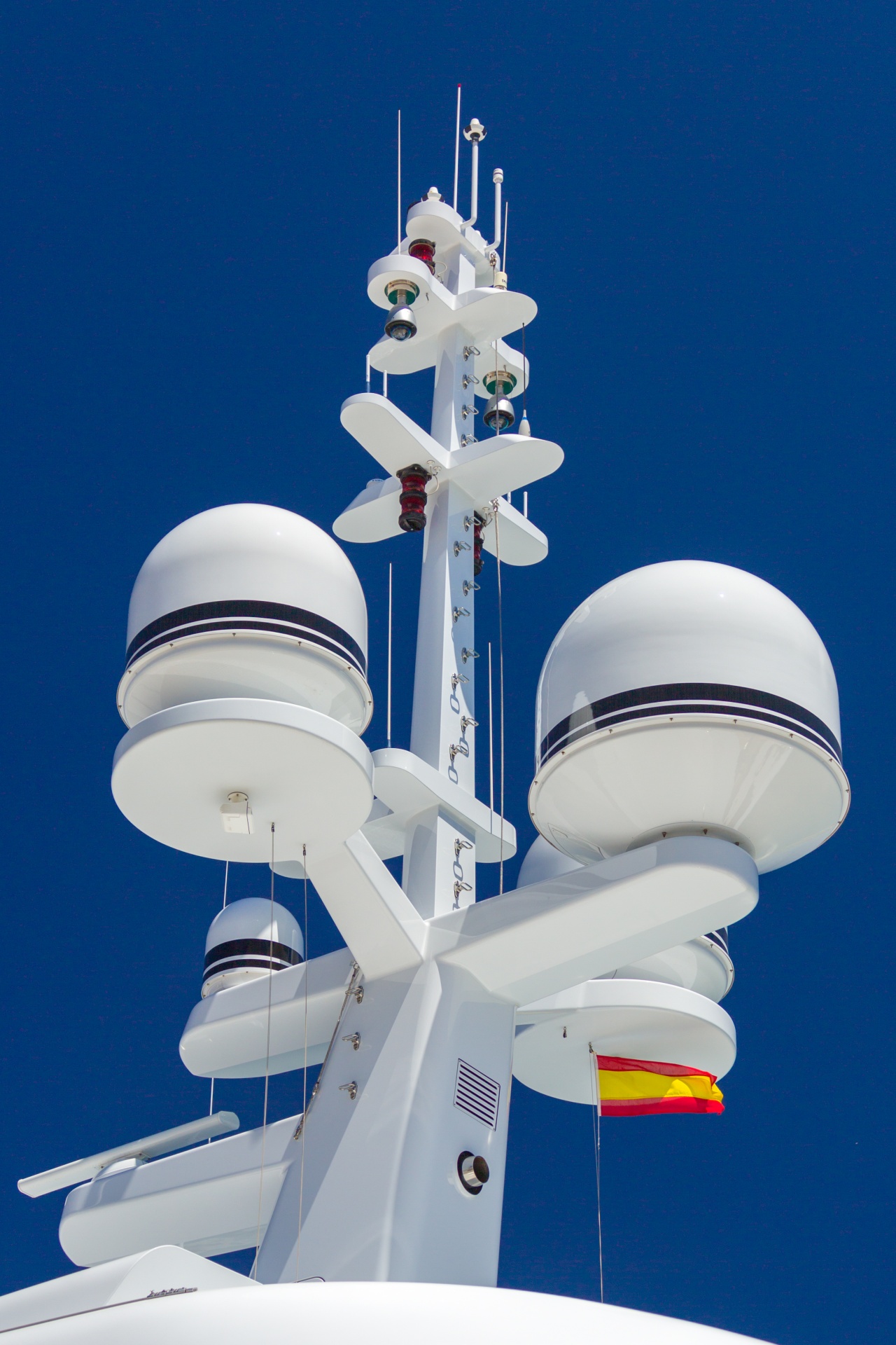 Yacht radar navigation system against blue sky