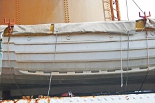 Lifeboat On Side Of Tug
