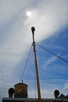 Mast Of Old Tug Against The Sky