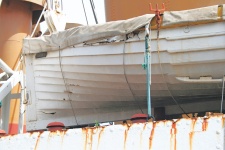 White Lifeboat On Tug