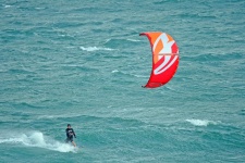 Windsurfer Canopy On Green Sea