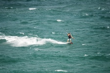 Windsurfer Holding On To Kite
