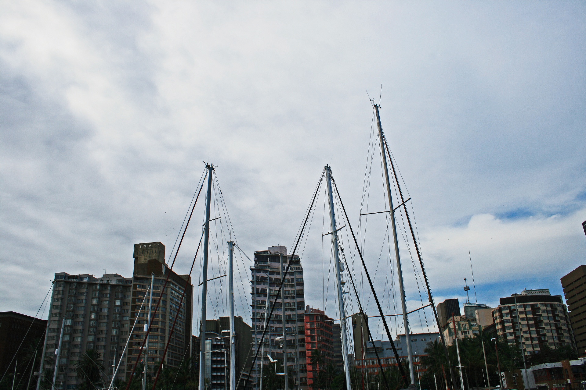 City Beyond Yacht Masts