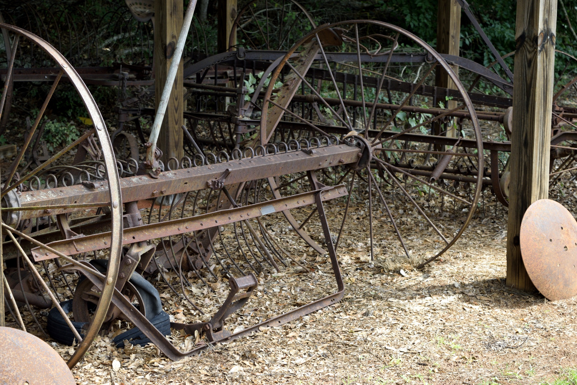 antique rusty farm equipment background
