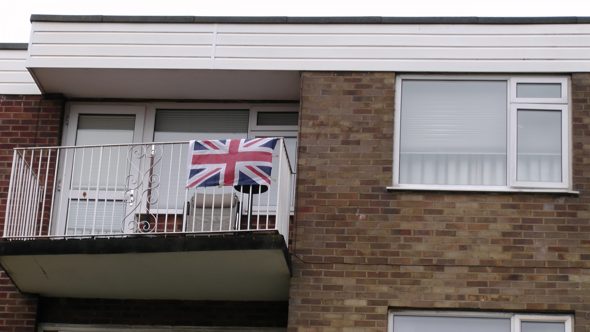 Union Jack Flag On Apartment Balcony