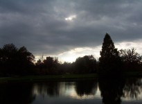 Dark Clouds Over Pond