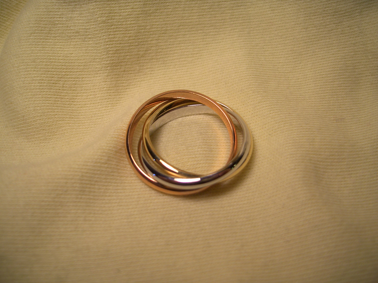 Ring in Silver, Gold and Bronze Color on Background