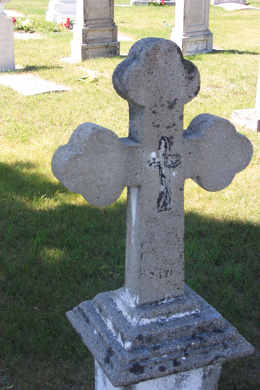 gravestone cross in cemetary
