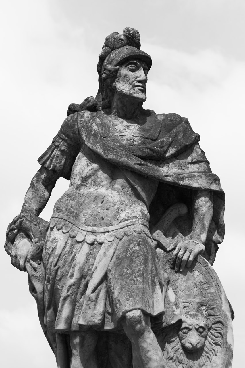 statue of a roman soldier in black and white