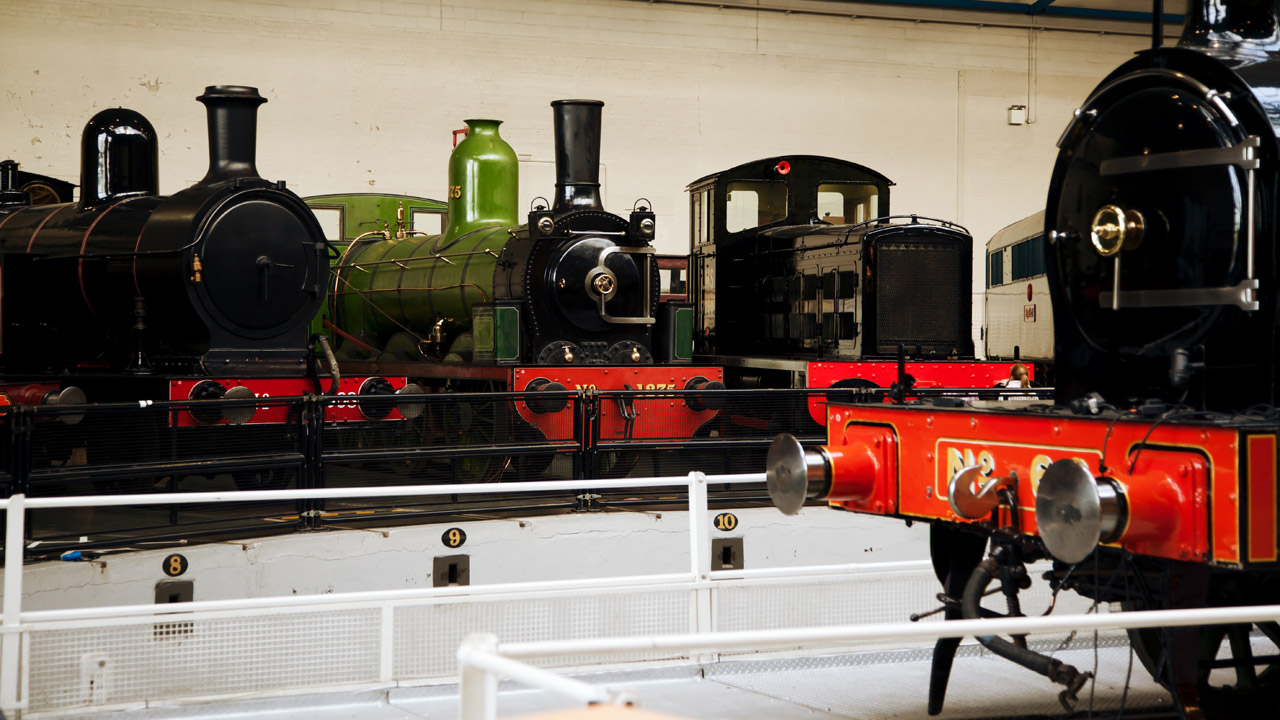 several steam engines in railway museum in York