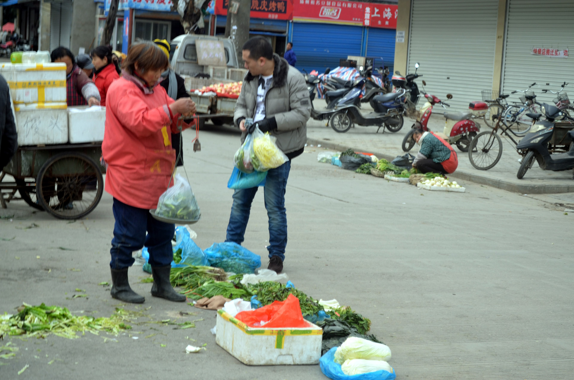 a farmer selling vegetables on the street