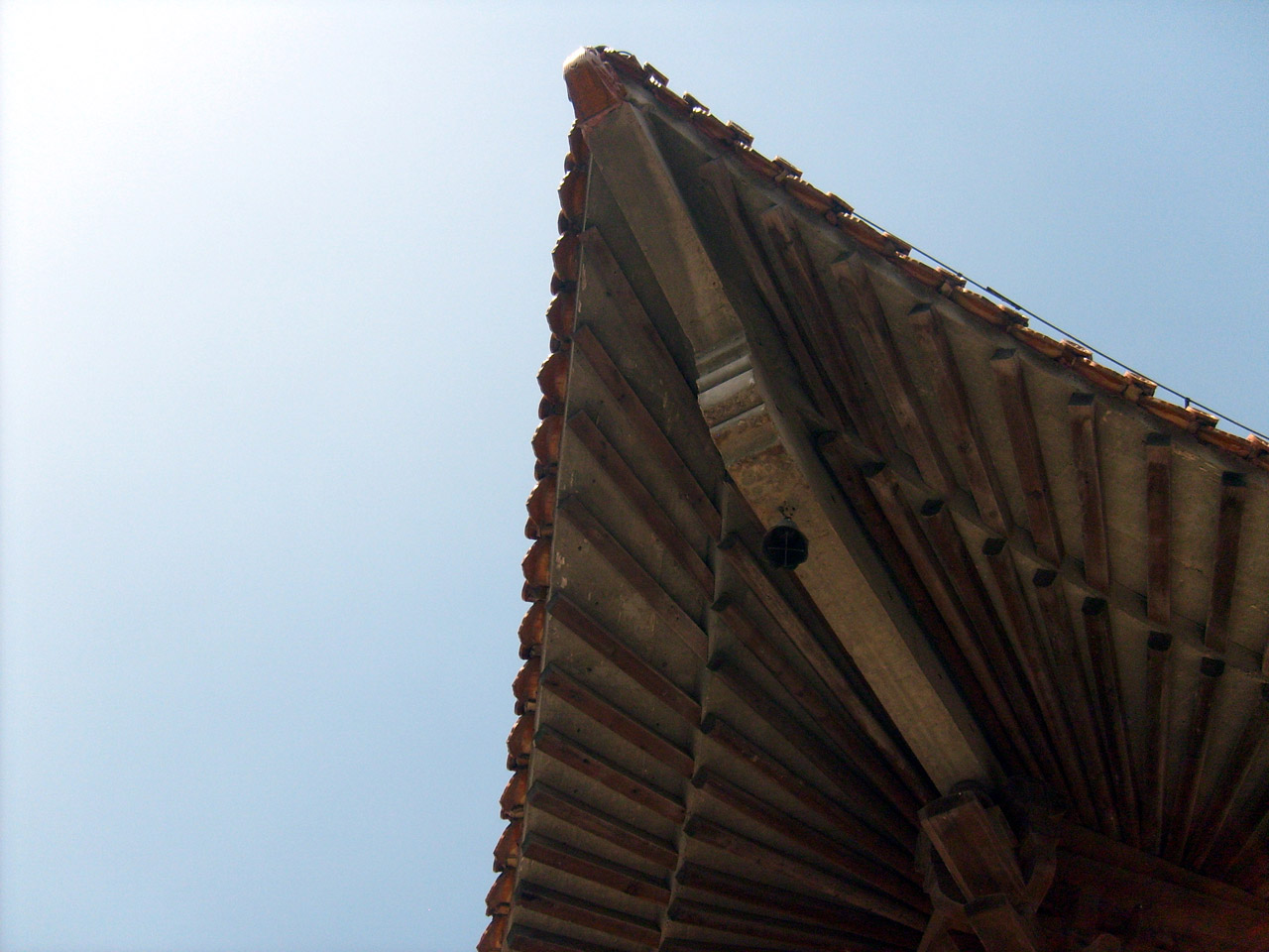 a truss supporting a Chinese temple roof