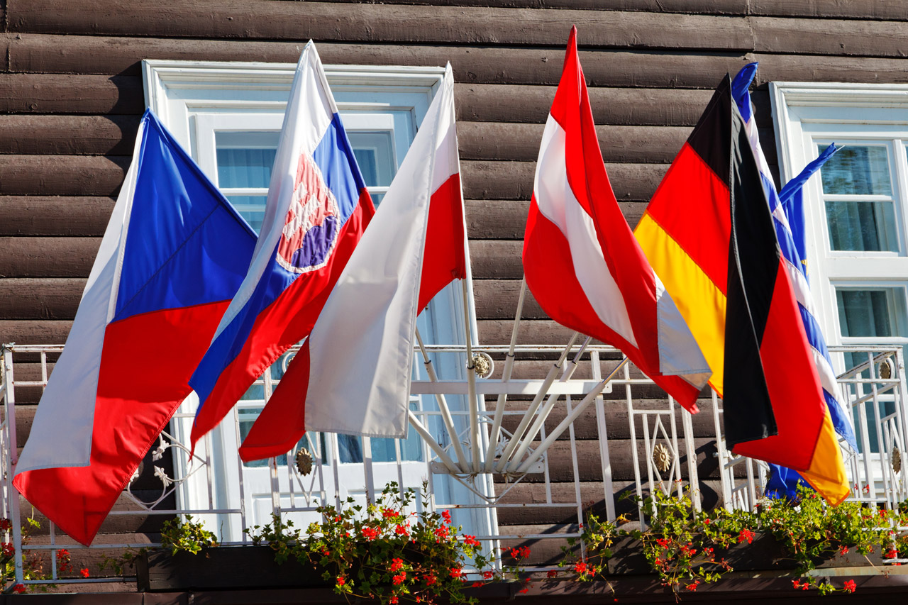 flags on balcony - Czech Republic, Slovakia, Poland, Austria, Germany, Greece and European Union