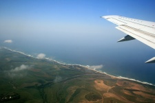 Flying Over Land And Sea