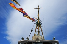 Old Tug Flying Coloured Flags