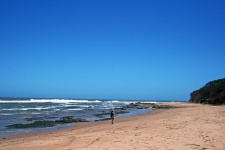 Solitary Figure On Beach