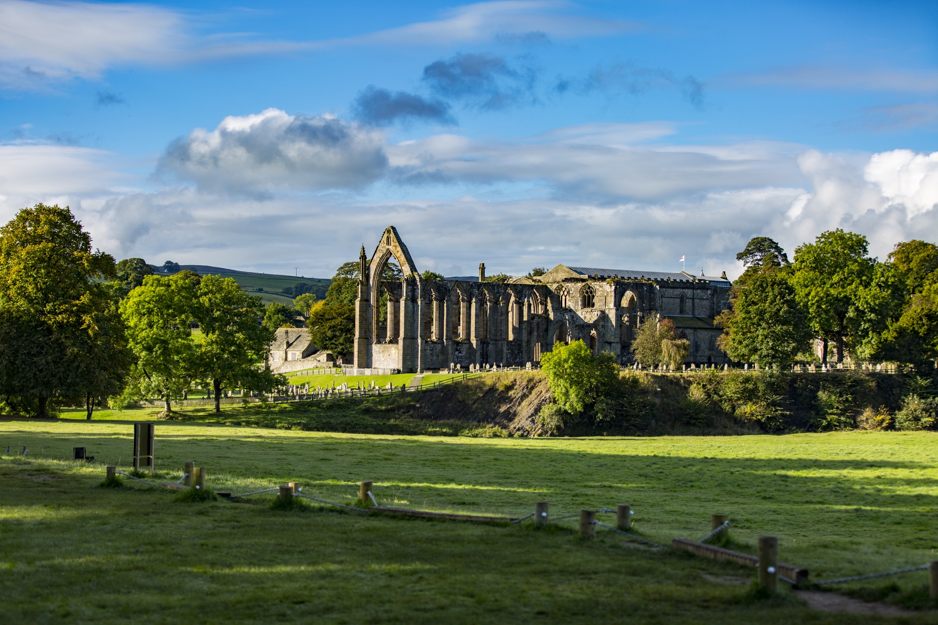 Bolton Abbey is an estate in Wharfedale in North Yorkshire, England, which takes its name from the ruins of the 12th-century Augustinian monastery—now generally known as Bolton Priory