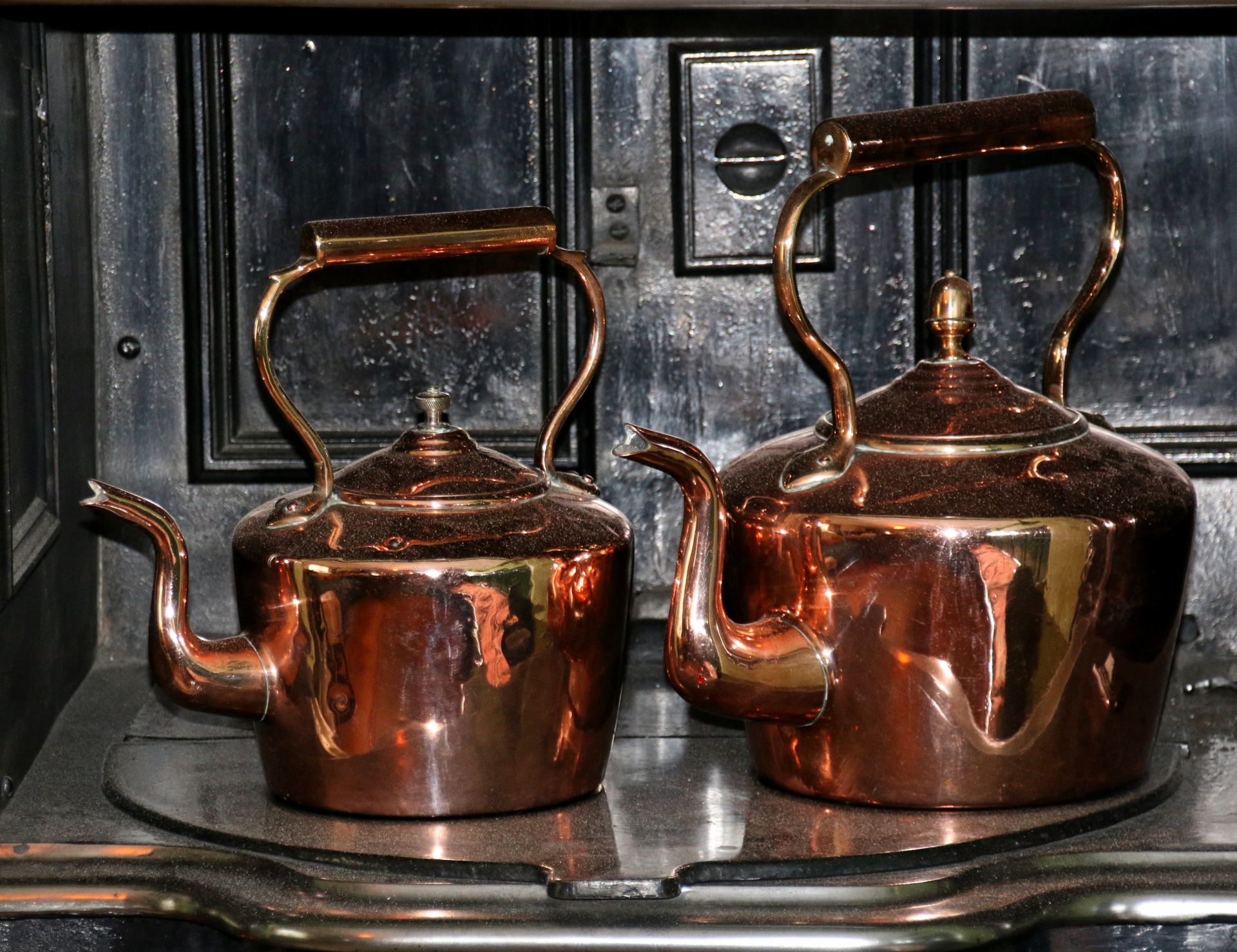 Copper kettles on an old coal range
