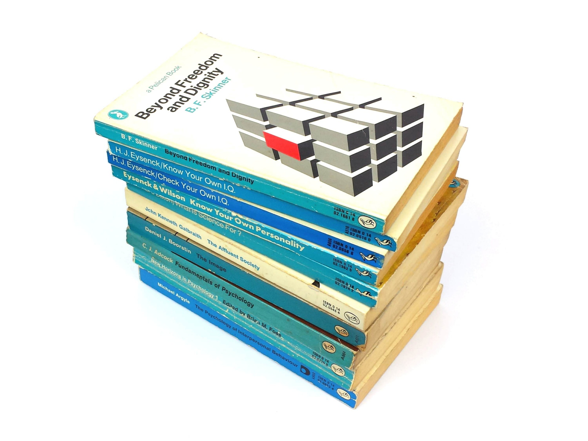 A collection of classic Pelican psychology paperbacks on a white background