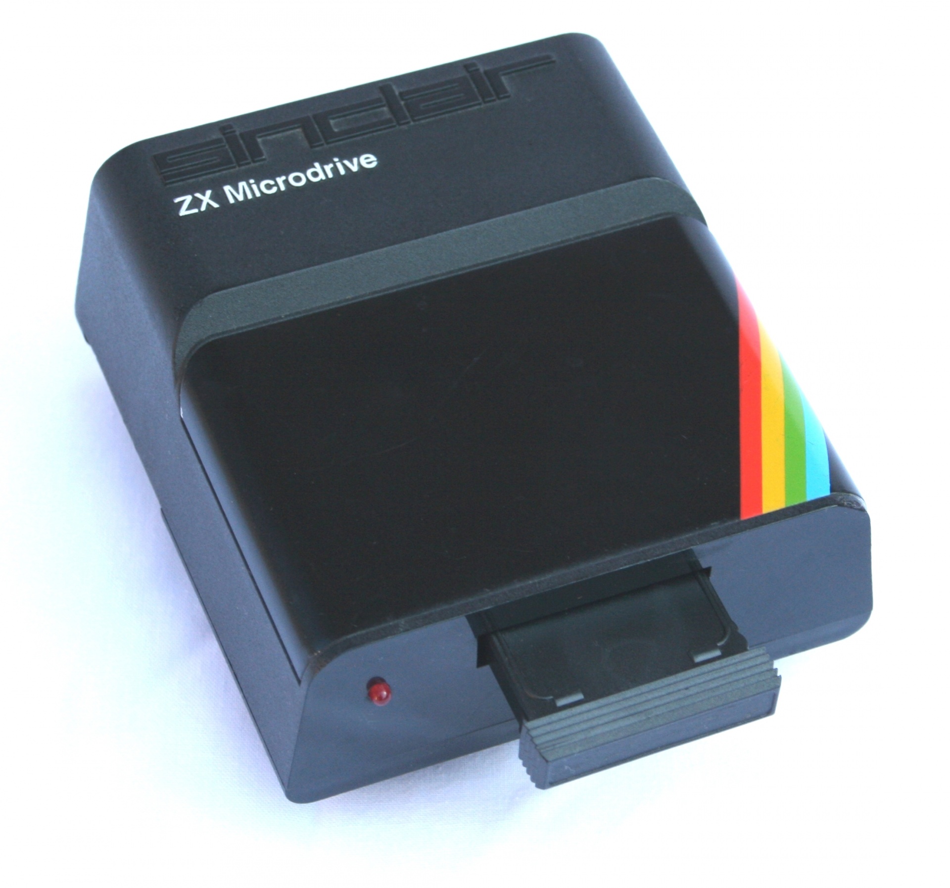 A single ZX Microdrive on a white background