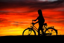 Girl And Bike Sunset