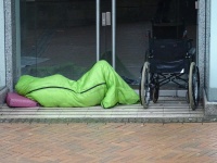 Homeless Person Sleeping In Doorway