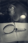 Magnifier And Old Book