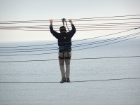Man Servicing Zip Line Cables