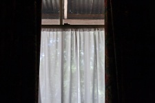 Vintage Window With White Curtain