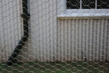 Hexagonal Wire With Old House