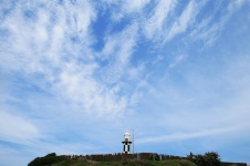 Lighthouse Under Cloudy Sky
