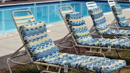 Lounge Chairs By A Pool