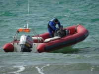 Man On Inflatable Speedboat