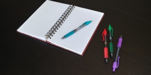Open Notebook With Pens