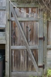 Rustic Wooden Door In Fence