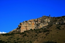 Sandstone Cliff Against Blue Sky
